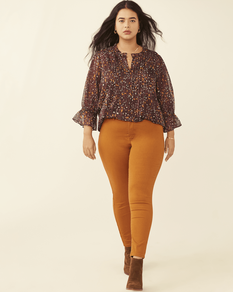 Plus size model with pear body shape wearing Brenda Stretch Skinny Jean by Curve Appeal | Dia&Co | dia_product_style_image_id:177974